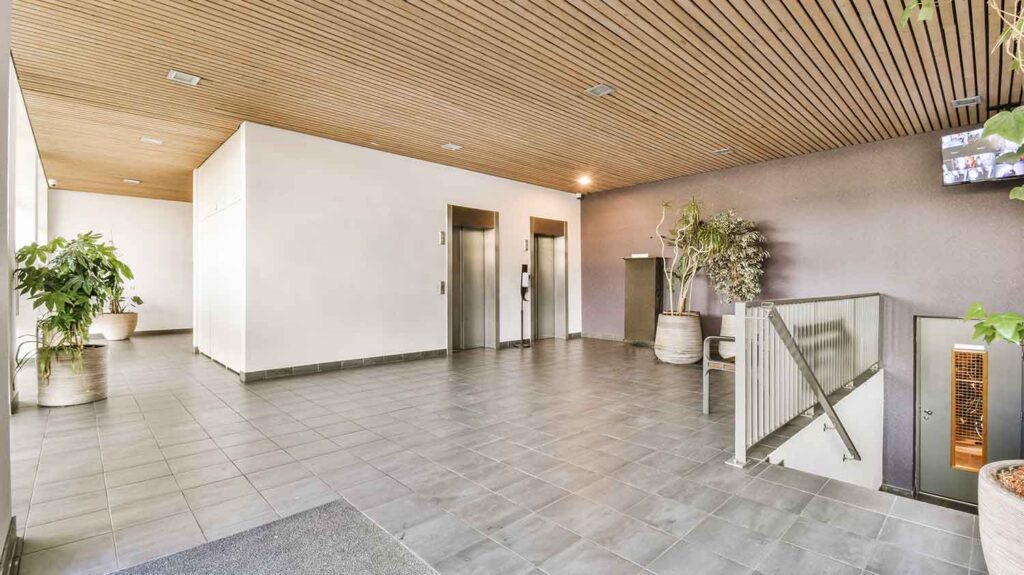 Wide Angle photo of a wooden roof hall and a modern wall texture