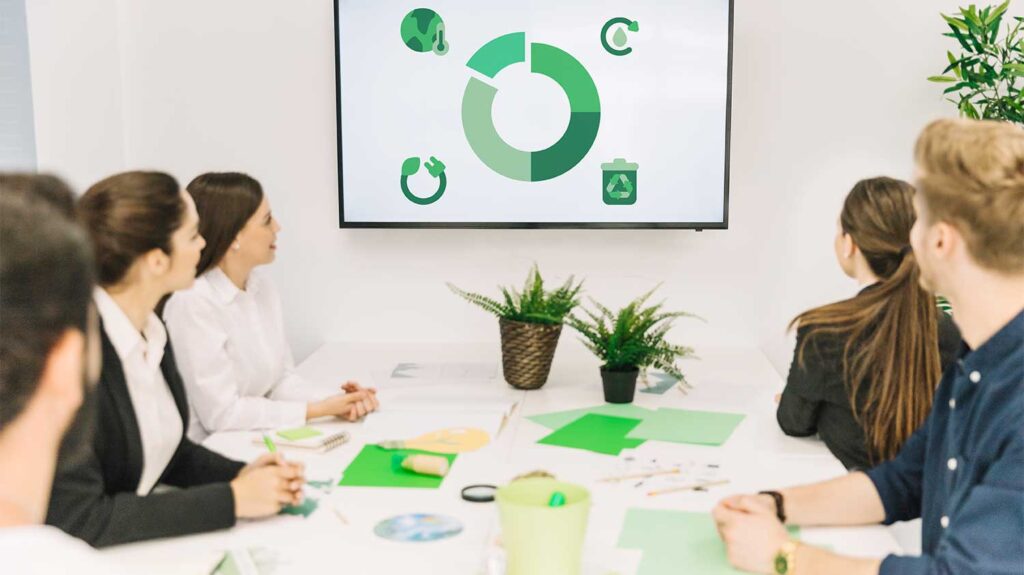 group of people engaged by a presentation in office