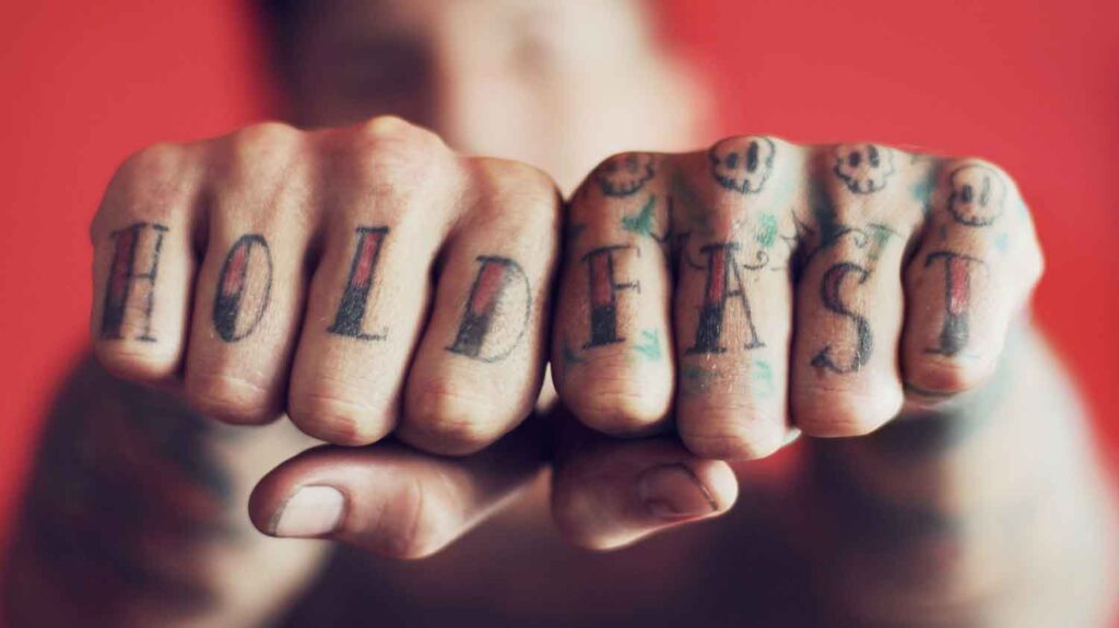 tattoo on fist fingers