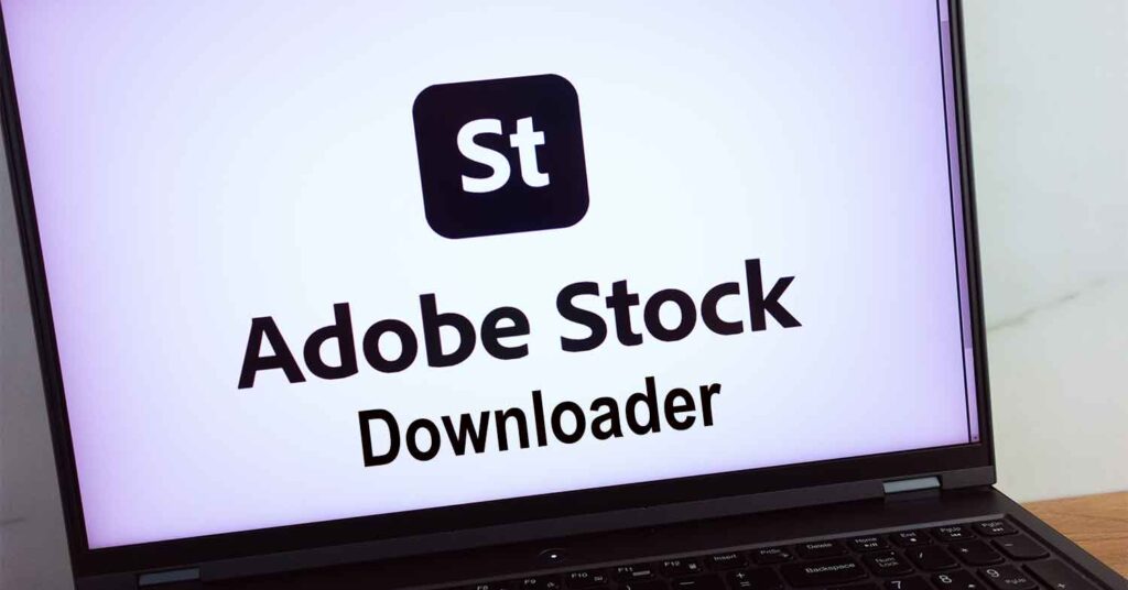 adobe stock downloader text on a laptop